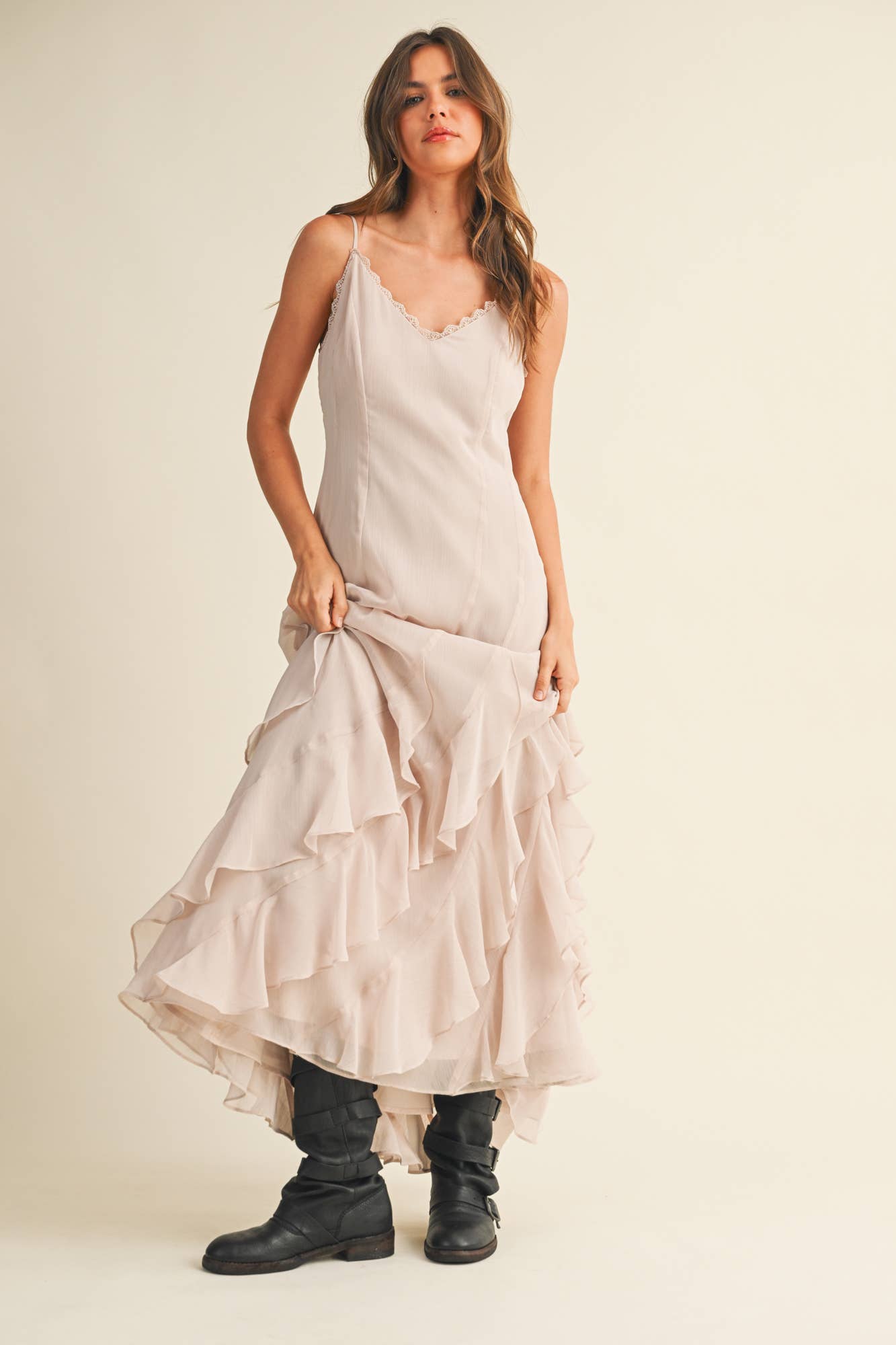 Flowy layered maxi dress with cascading ruffles.
