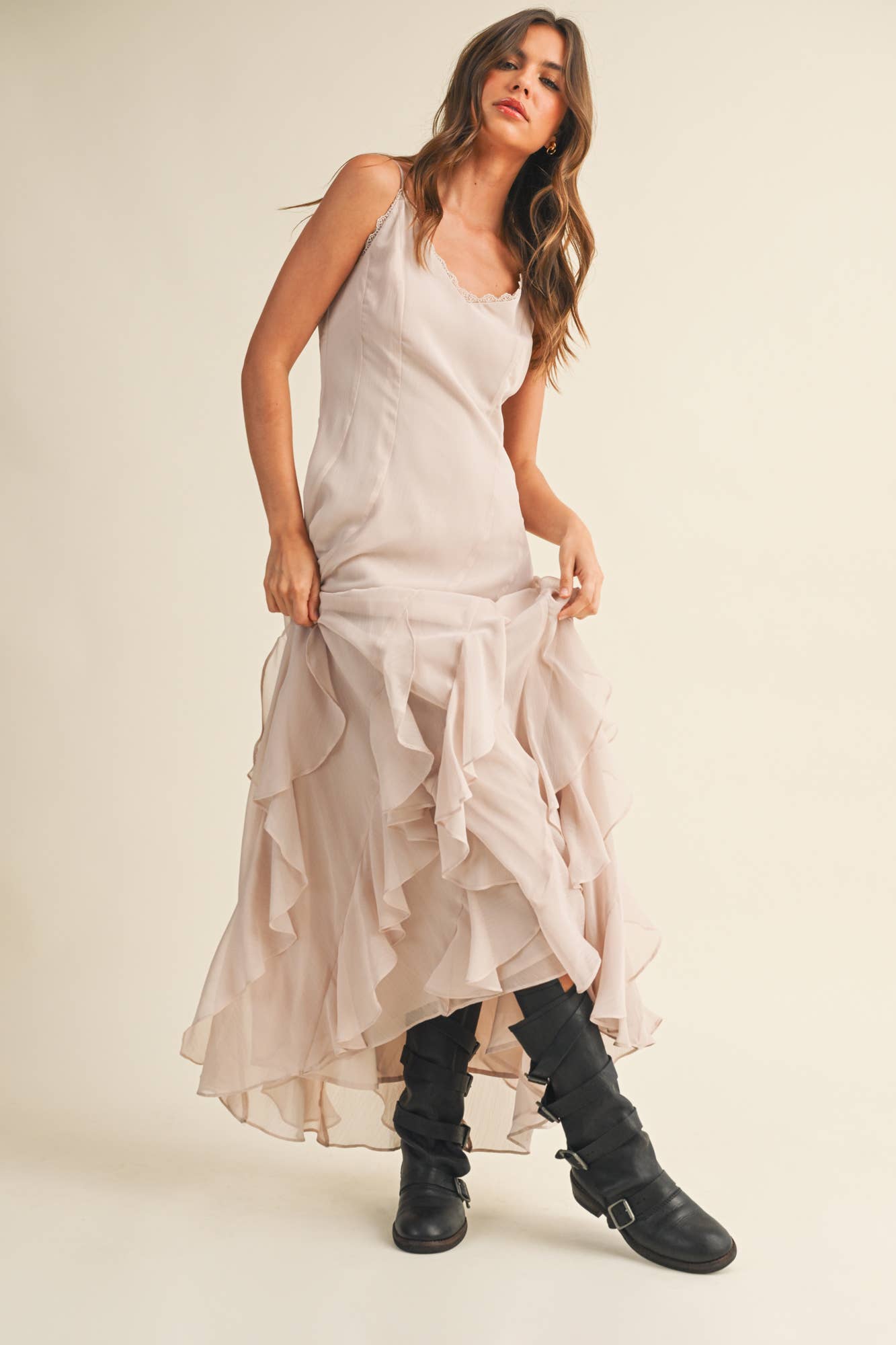 Romantic neutral ruffle maxi dress with lace trim neckline.