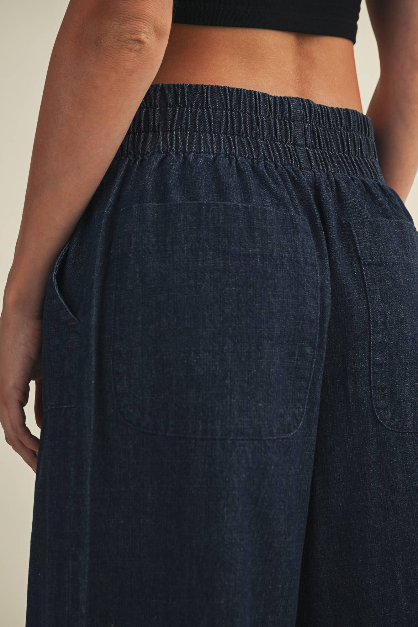 Elastic-back wide-leg jeans with tailored front seams.