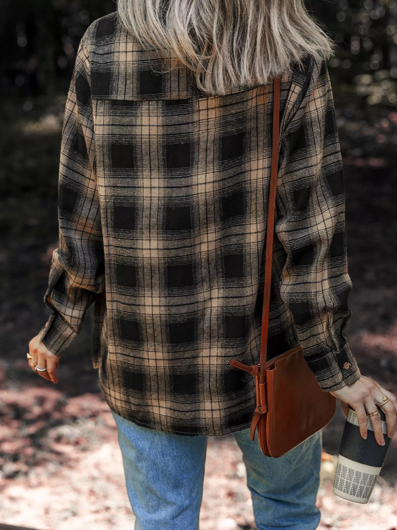 Oversized plaid shirt for fall layering.