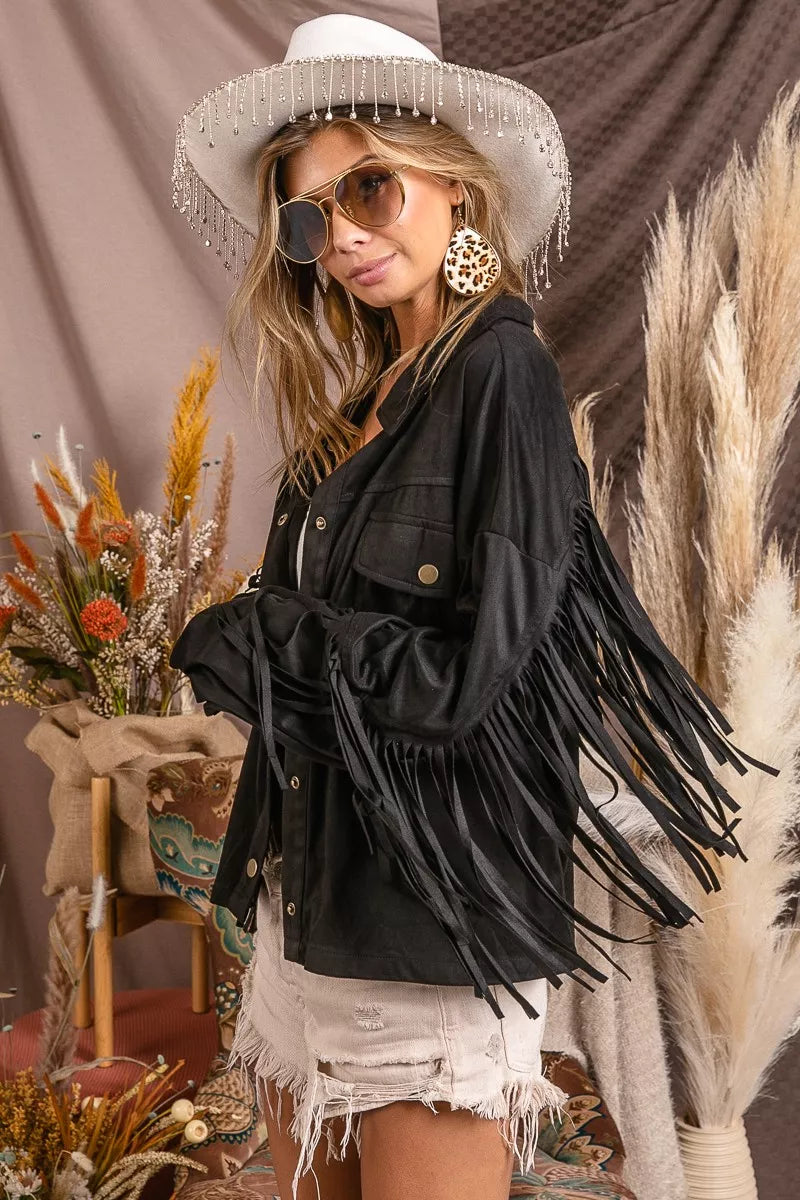 Western-inspired suede jacket with fringe sleeves.